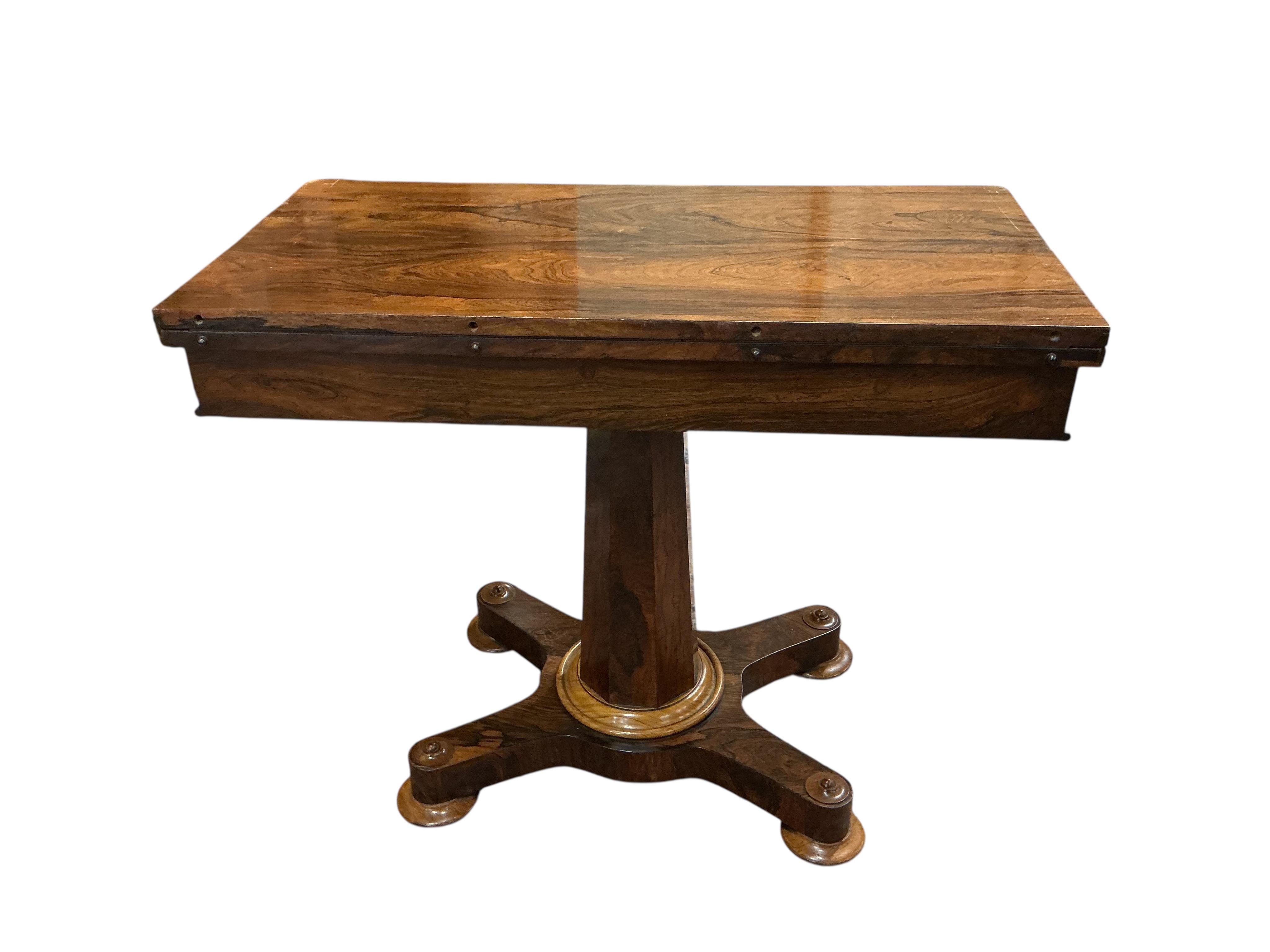 An early Victorian rectangular rosewood folding card table, width 91cm, depth 45cm, height 77cm